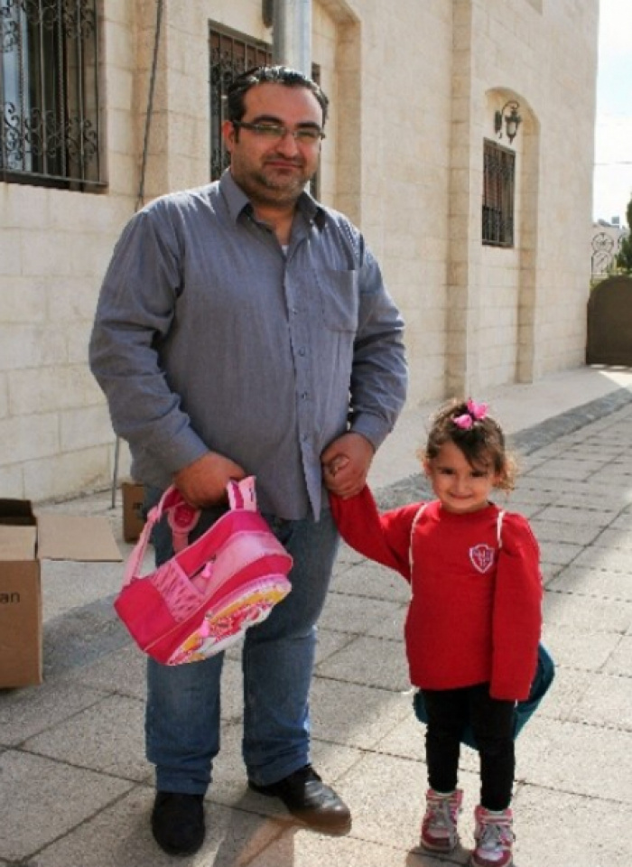 Tajik and daughter - Syrian refugees in Jordan